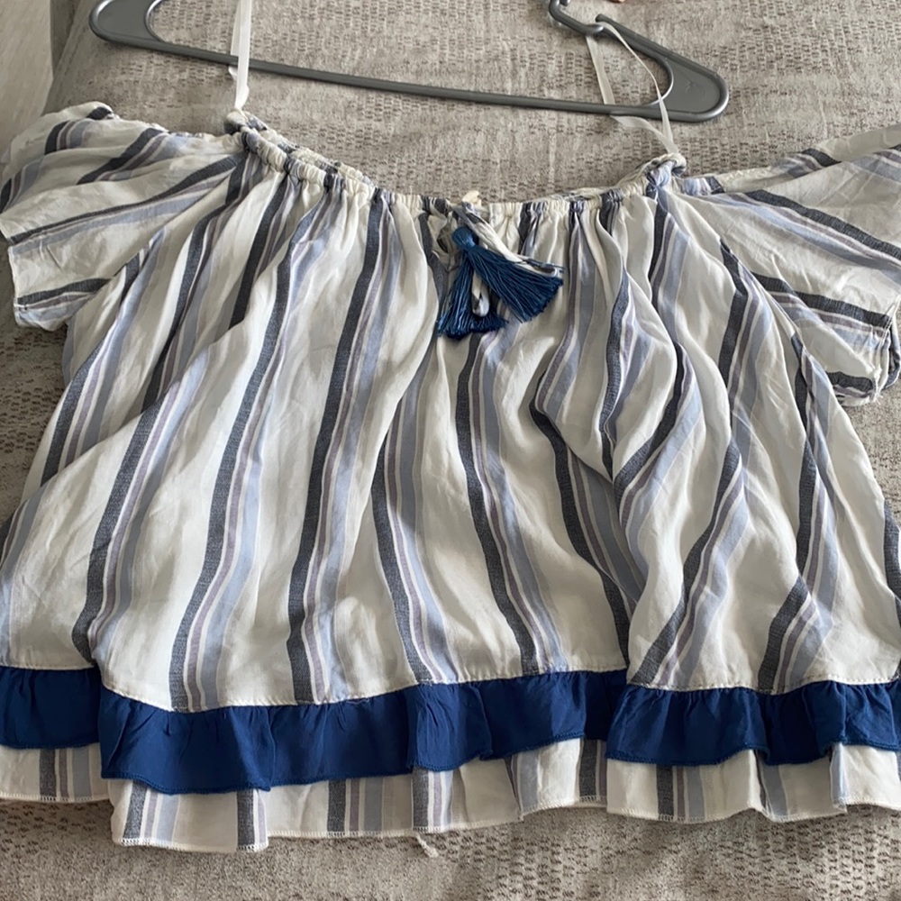 off the should blue striped top